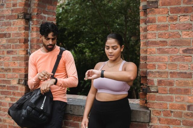 Fitbit Air and Whoop 5.0 screenless fitness trackers side by side