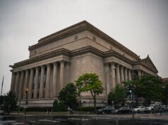 DOJ Blocks IRS From Auditing Trump Family DOJ building Washington DC IRS settlement Trump audit ban May 2026