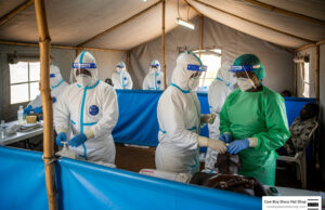 In Depth Guide to New Ebola Outbreak in Eastern DR Congo New Ebola outbreak eastern DR Congo health workers protective gear Ituri Province