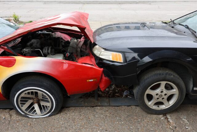 No-Pay No-Play car insurance accident scene with legal documents
