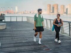 The New Era of Lifestyle and Wellness Insurance lifestyle and wellness insurance professional using wearable device to track health metrics
