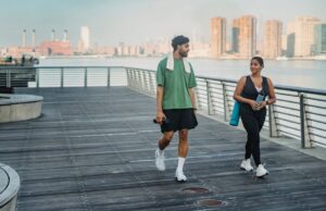 The New Era of Lifestyle and Wellness Insurance lifestyle and wellness insurance professional using wearable device to track health metrics