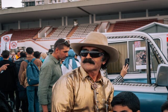 festival goers wearing cowboy hats disco cowboy hats 2026 trends